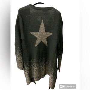 Festive black cardigan with gold star on the back